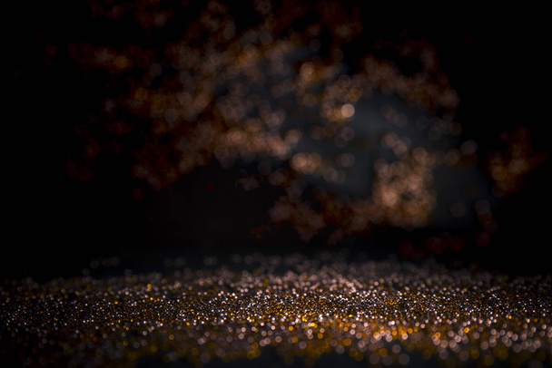 glitter vintage lights background. gold, silver, blue and black. de-focused. - Fotó, kép