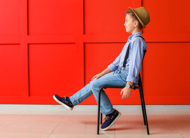 Cute fashionable boy on color background - Valokuva, kuva