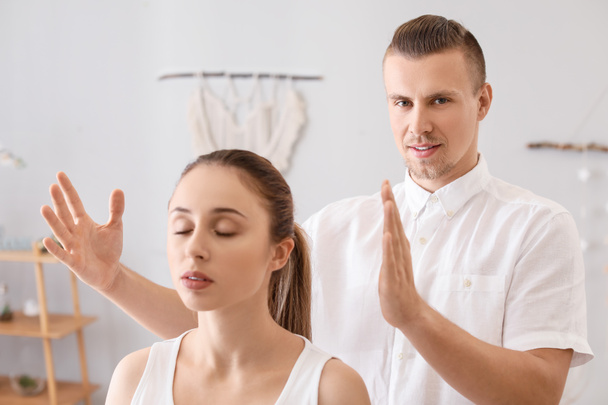 Reiki master working with patient - Photo, Image