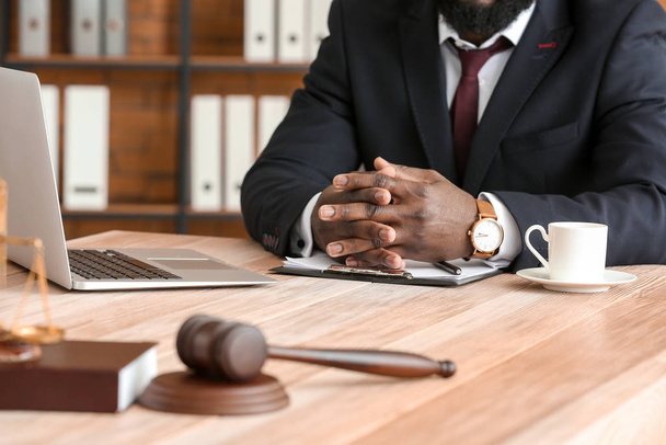 African-American lawyer at table in office - Photo, image