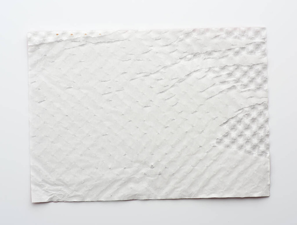 folha de papel branco retangular sobre fundo branco
, - Foto, Imagem