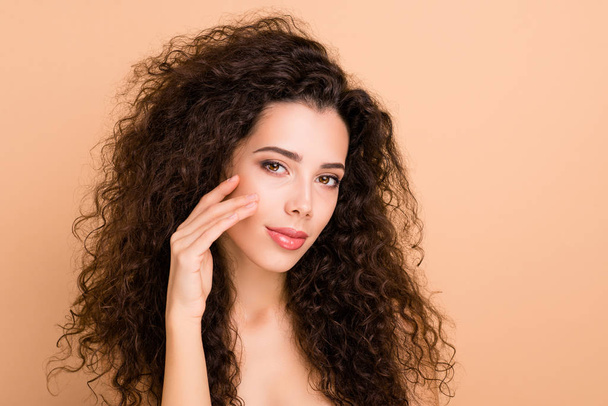 Close up photo beautiful she her lady smearing balm facial skin healthy condition laser method against plastic surgery ideal appearance plump allure tempting lips no clothes isolated beige background - 写真・画像