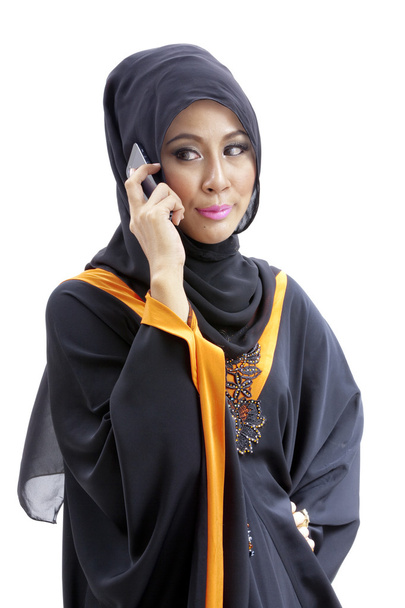 Beautiful Muslim business woman calling - Photo, image