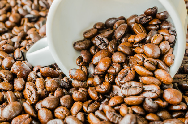 Coffee beans on cup - Valokuva, kuva