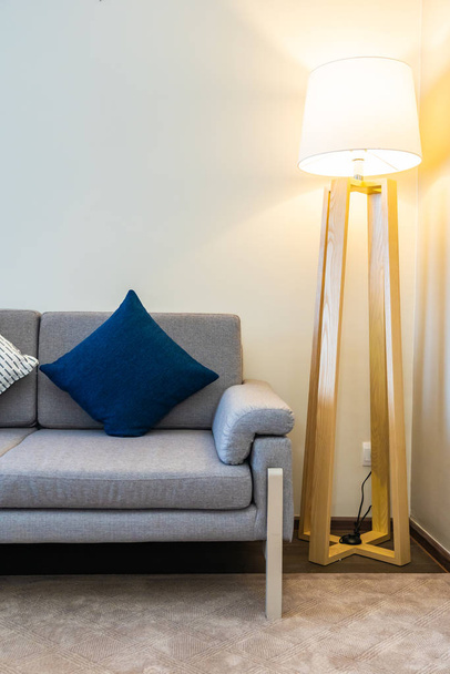 Comfortable pillow on sofa decoration with light lamp interior - Foto, immagini