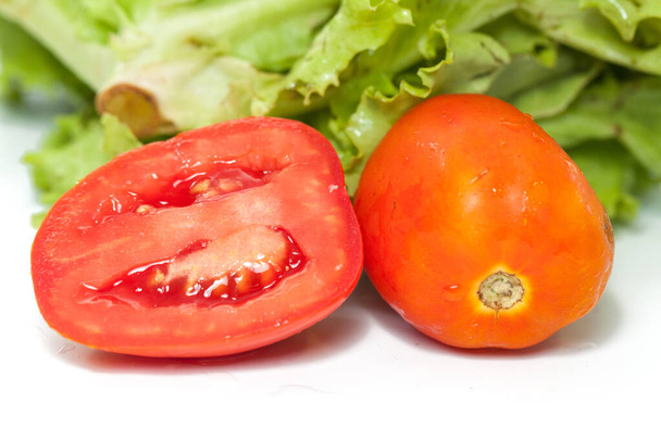fresh lettuce and tomato isolated on white background - Valokuva, kuva
