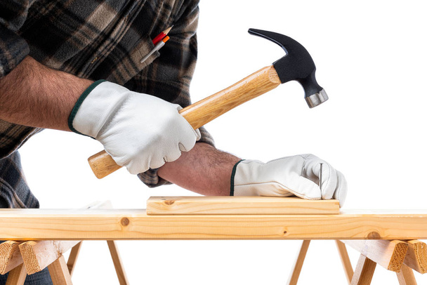 Carpenter at work on wooden boards. Carpentry. - Фото, зображення