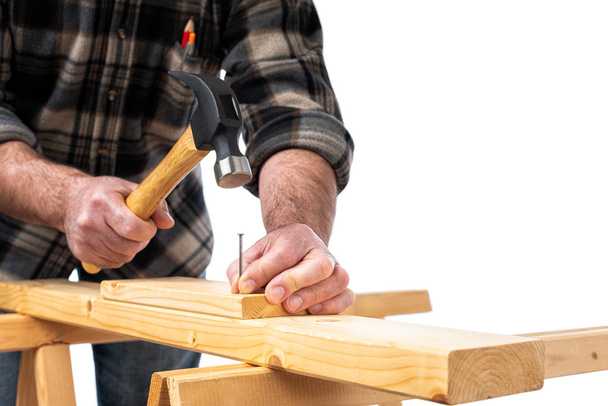 Carpenter at work on wooden boards. Carpentry. - Foto, imagen
