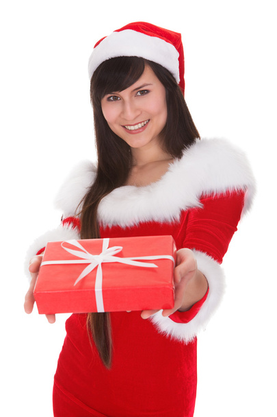 Female Santa Holding Gift - Foto, afbeelding