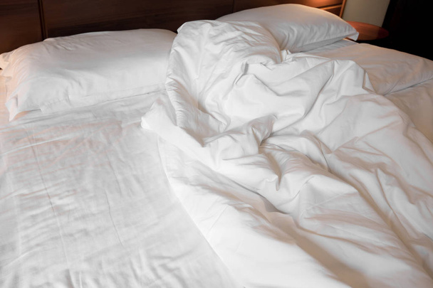 Unmade bed in a hotel room - Photo, Image
