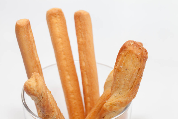 bread stick on cup isolated on white background - Foto, Imagen