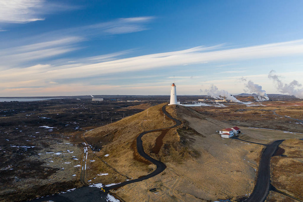 Aerial view of the lighthouse at Reykjanes Peninsula during sunset. Iceland in early spring - Photo, Image
