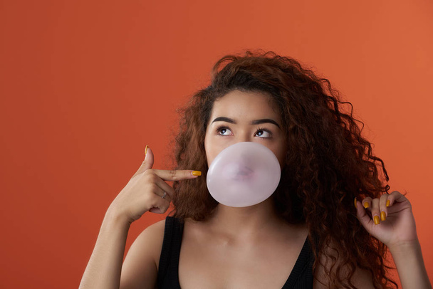 Teenager girl with bubble gum - Фото, изображение