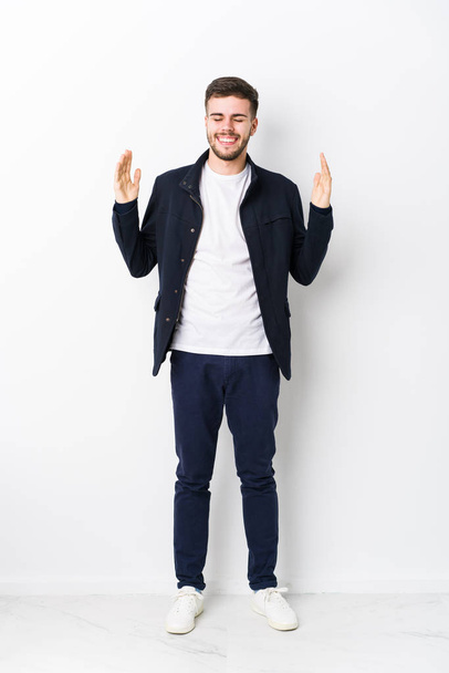 Full body young caucasian man isolated joyful laughing a lot. Happiness concept. - Fotografie, Obrázek