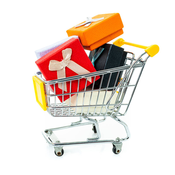 Trolley with gifts on a white background.  - Photo, Image