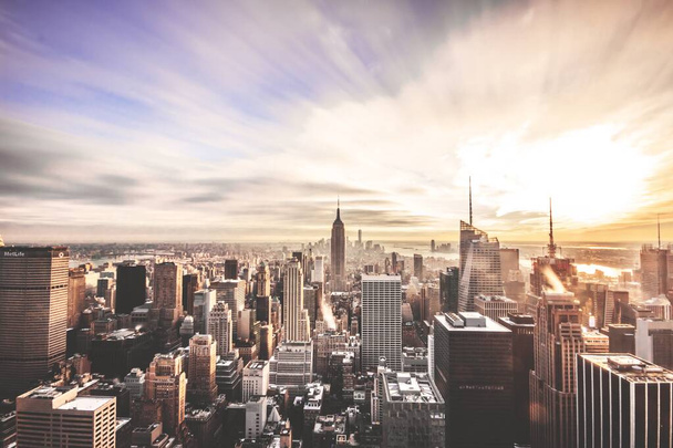 A breathtaking scenery of the sunset from the Rockefeller Center, New York - Photo, image
