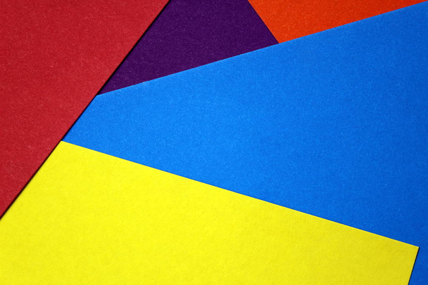 colored cardboard scattered on the table. turned out geometric shapes - 写真・画像