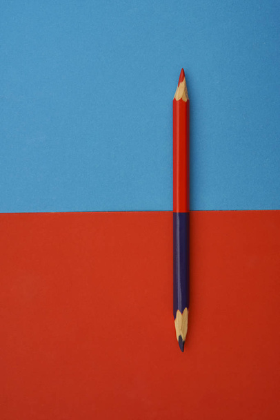 one big pencil on  paper background.  - Фото, изображение