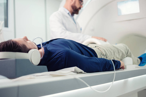 Patient visiting MRI procedure in a hospital - Foto, imagen