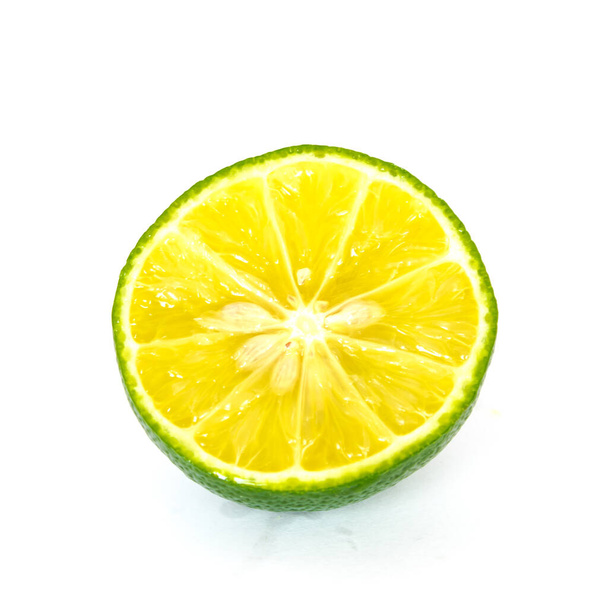 Slide cut lime isolated on white - Photo, Image