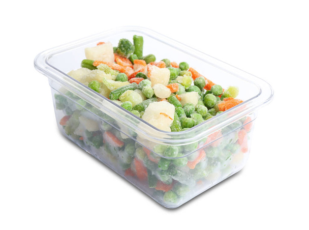 Frozen vegetables in plastic container isolated on white - Zdjęcie, obraz