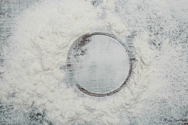 Flour on wooden background, top view. Space for text - Φωτογραφία, εικόνα