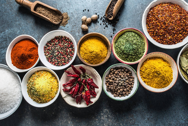 Set of variety aromatic spices and herbs in bowls - 写真・画像