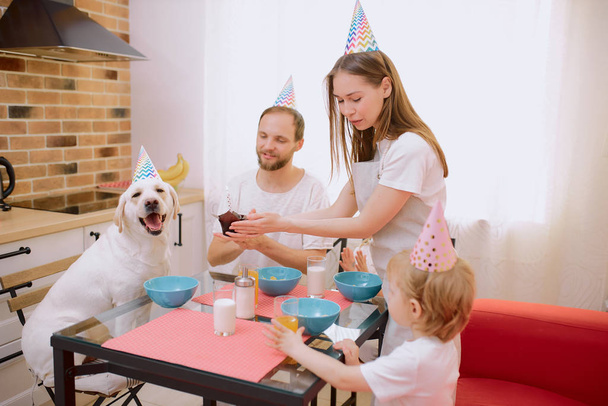 beautiful happy family celebrating birthday - Foto, Bild