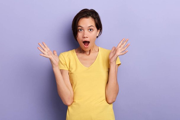 emotional surprised girl being shocked with news - Foto, Imagen