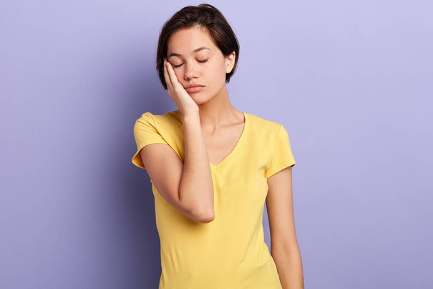 depressed unhappy woman suffering from toothache over blue background - Foto, Imagem