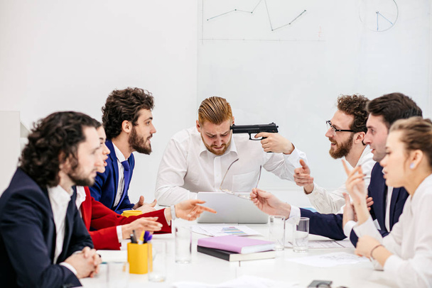Unhappy swearing business people in group meeting in office - Фото, зображення