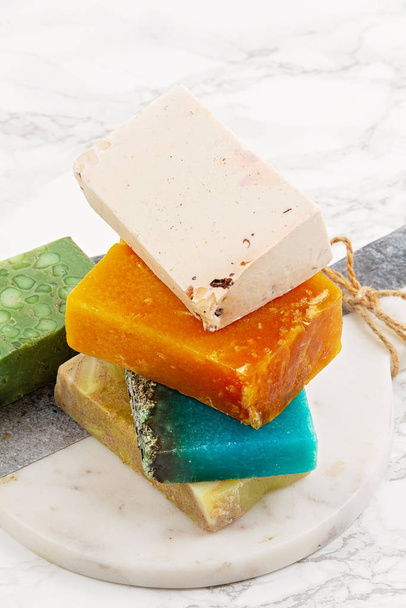 Handmade natural soap, eco friendly spa, beauty skincare concept. Small business, ethical shopping idea. Soap and dry shampoo bars packed in plastic free - Foto, imagen