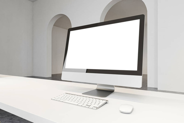 Mock up computer screen in spacious office - Foto, imagen