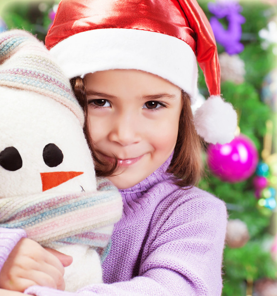 Little girl in Santa hat - Photo, Image