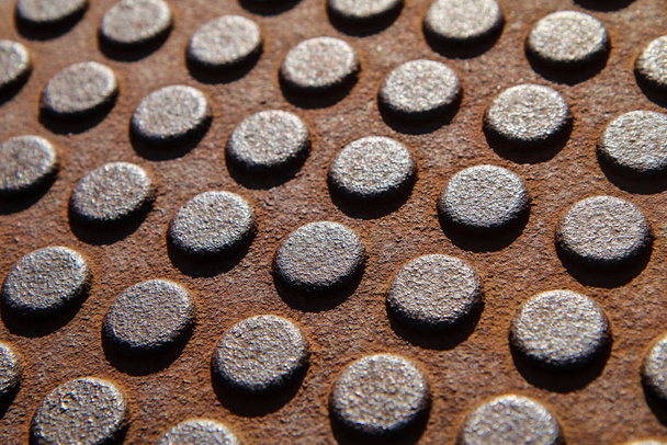 A detail of the many rivets on an industrial construction. Or of a texture which simulates the rivets. - Foto, Imagem