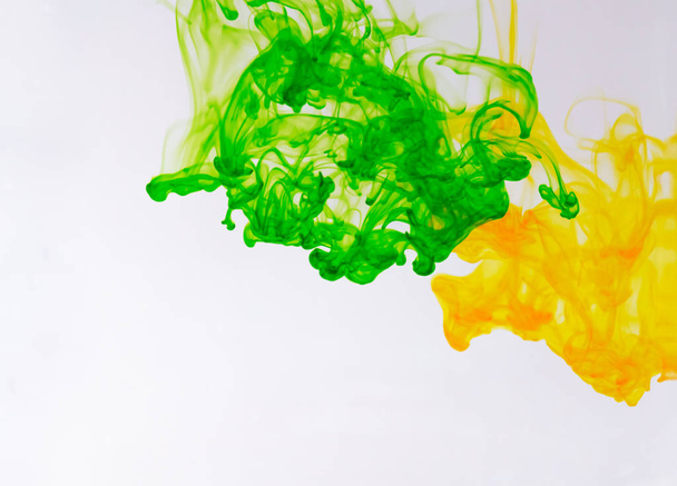 Food color drop and dissolve in water for abstract and background. - Photo, Image