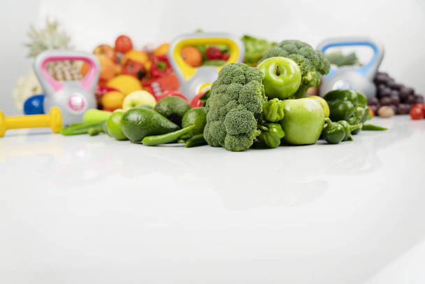 closeup view on fresh vegetables and fruits, sport and healthy life concept - Photo, Image