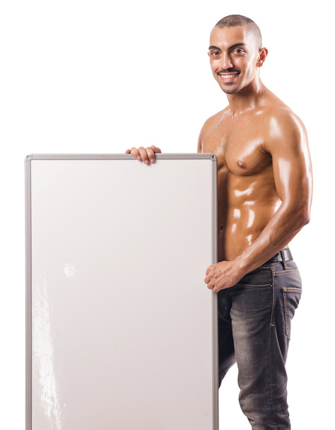 Half naked man with blank board - Foto, Imagen