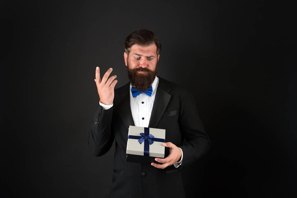 Moment of choosing best product. Bearded man hold present box. Businessman shopping for gift. Product promotion. Product advertising. Sale and discount. Black Friday. Desire meets new product - Fotografie, Obrázek