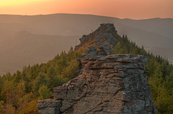Big rocks at orange romantic sunset in Jeseniky Czech Republic - Photo, Image