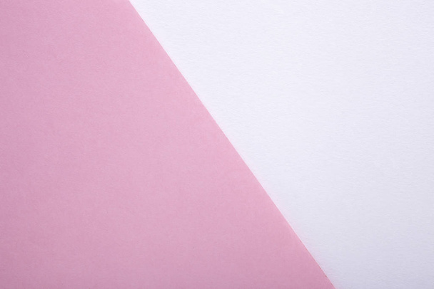 Pink and white pastel paper texture as background. Top view - Foto, Bild