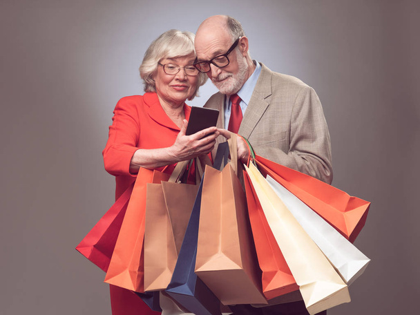 Senior couple shopping online - Fotó, kép