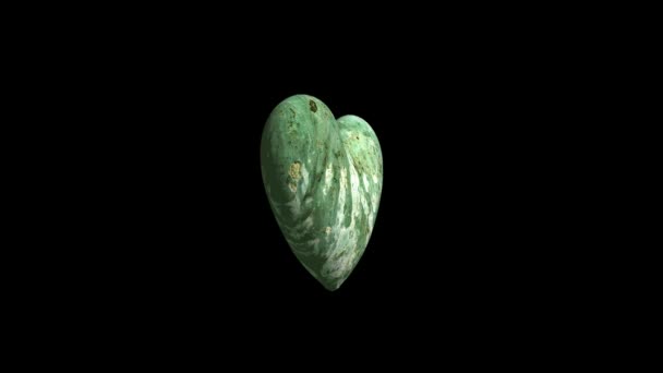 Stylowe 3D zielone marmurowe serce obracające się w ciemnej przestrzeni, Walentynki glamour footage - Materiał filmowy, wideo
