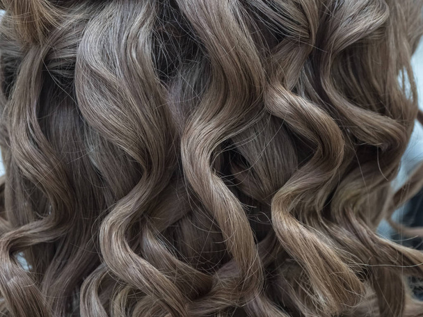 Хвилясте волосся як текстура тла
. - Фото, зображення