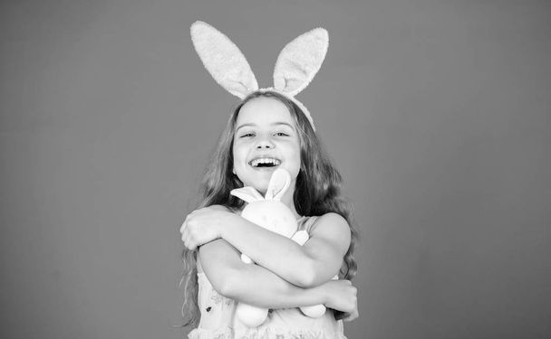 Playful baby celebrate easter. Spring holiday. Happy childhood. Happy easter. Ready for Easter day. Easter activities for children. Holiday bunny girl with long bunny ears. Child cute bunny costume - Foto, imagen