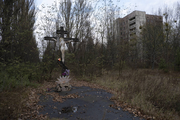 Chernobyl pripyat abandoned crucifix at the crossroads center - Photo, Image