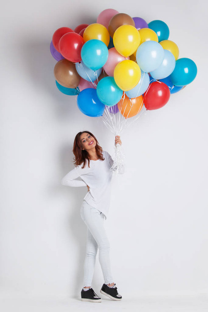 Woman with colored balloons - Фото, зображення