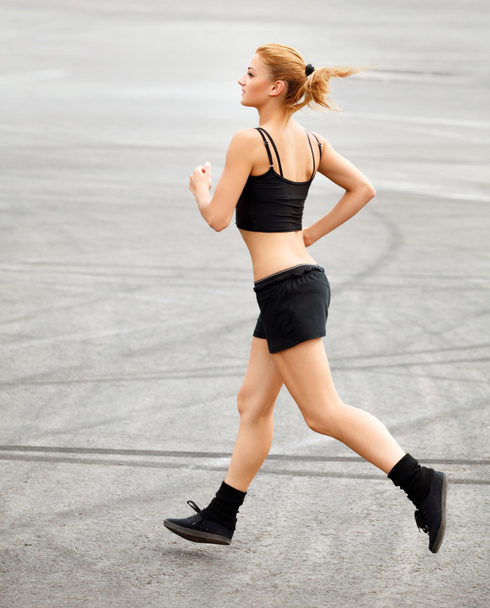 Athletic Runner Training in a park for Marathon. Fitness Girl - Photo, Image