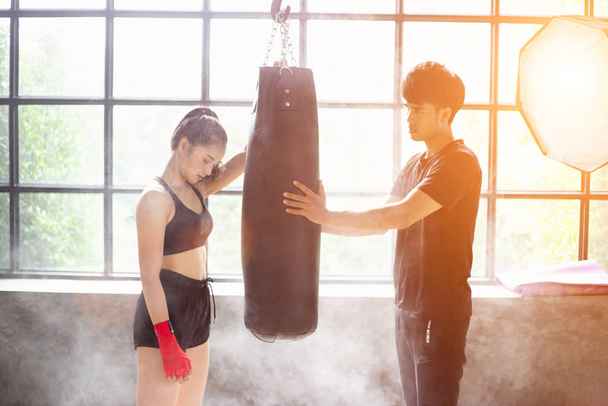 Muay Thai workout - Motivational training at the gym facility stock photo - Photo, Image