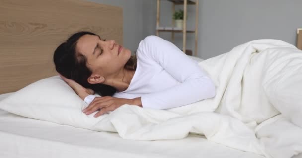 Unhappy young lady suffering from fibromyalgia after sleeping. - Filmagem, Vídeo